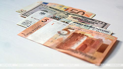 Белорусский рубль на торгах 24 ноября ослаб к трем основным валютам